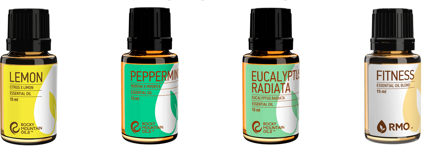 four rocky mountain essetial oils in a line - lemon, peppermint, eucalyptuc, fitness