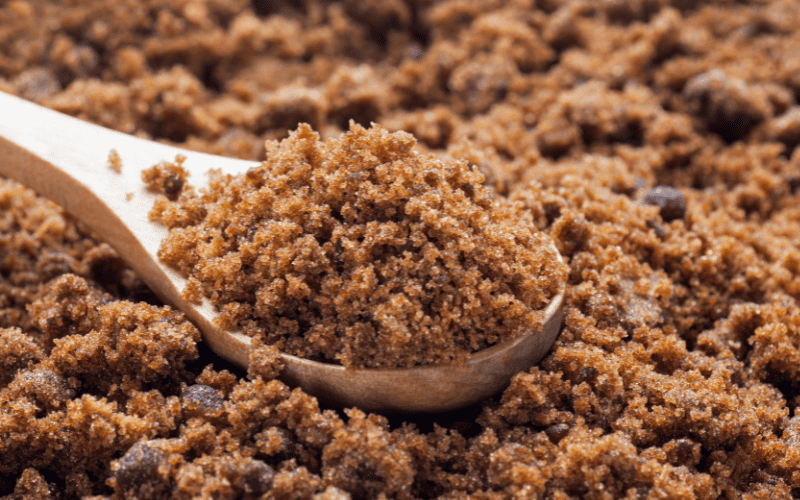 Best Substitute for Honey: 9 Alternatives to Sweeten Your Recipes Kelly Bejelly A pile of brown sugar fills the frame, with a wooden spoon heaped with more brown sugar resting on top.