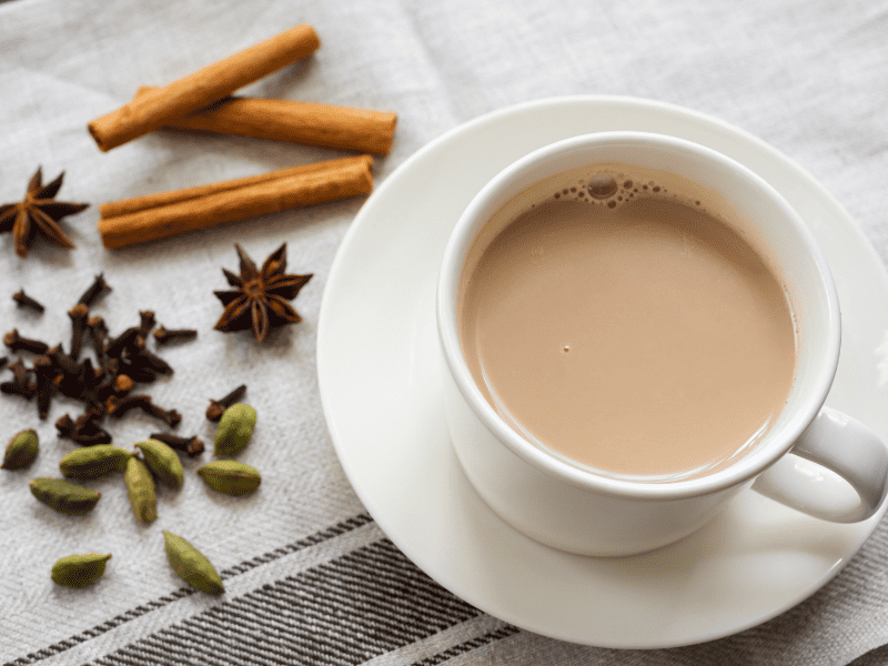Dirty Chai Latte: A Spicy Twist on Your Favorite Drink Kelly Bejelly cup of dirty chai latte with spices around it