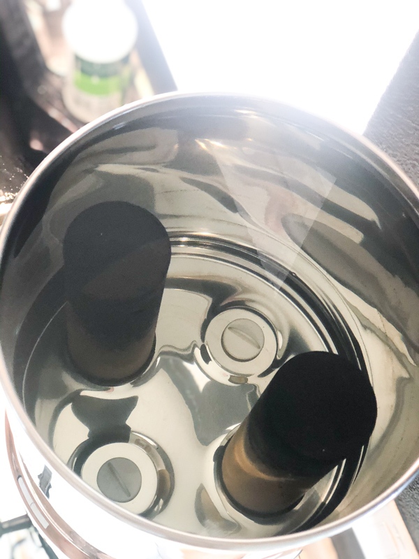 Berkey Water Filter Review Kelly Bejelly Showing inside of the top chamber of a Royal Berkey Water filter with two black filters in this berkey water filter review