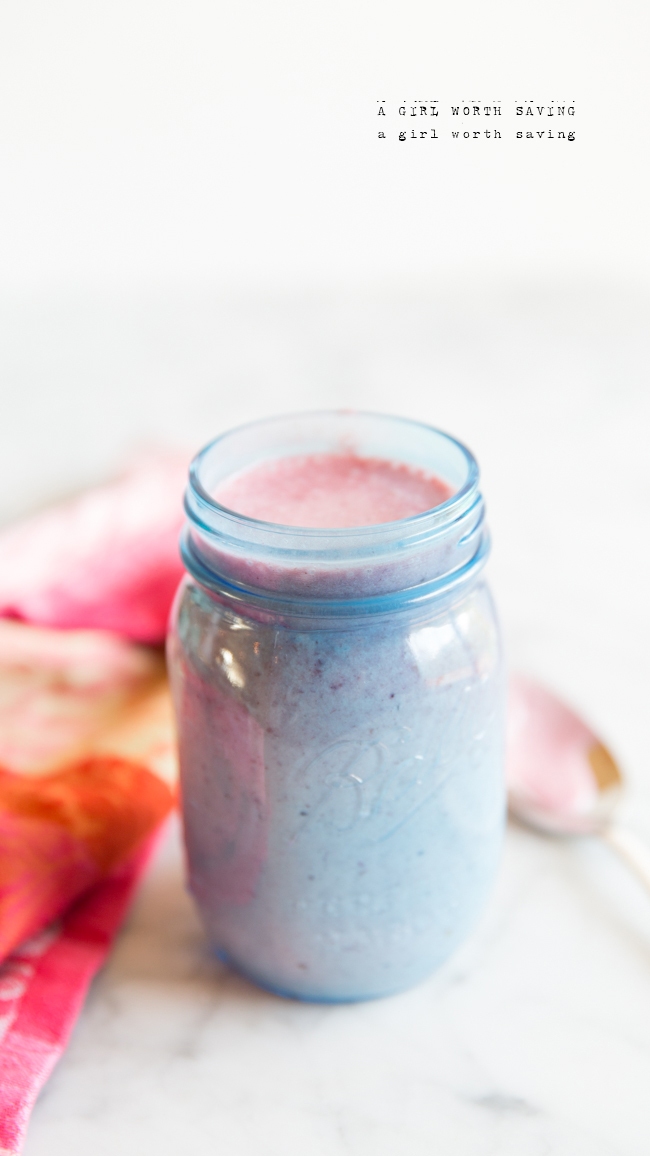Cranberry Smoothie Kelly Bejelly cranberry smoothie in a glass jar with a spoon on the side