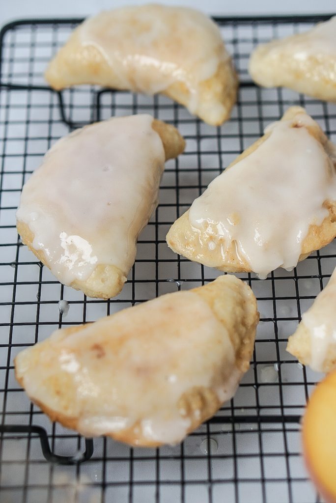 Grandma Ruth's Fried Peach Pies using Einkorn Flour Kelly Bejelly Einkhorn Fried peach pies on a cooling rack
