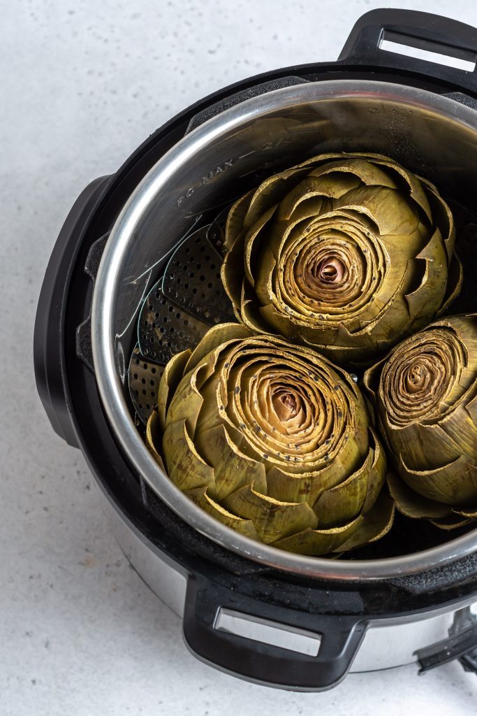 Instant Pot Artichokes Kelly Bejelly Are you sick of your stovetop taking forever to cook artichokes? Make instant pot artichokes in a fraction of the time using this super simple recipe! Check it!