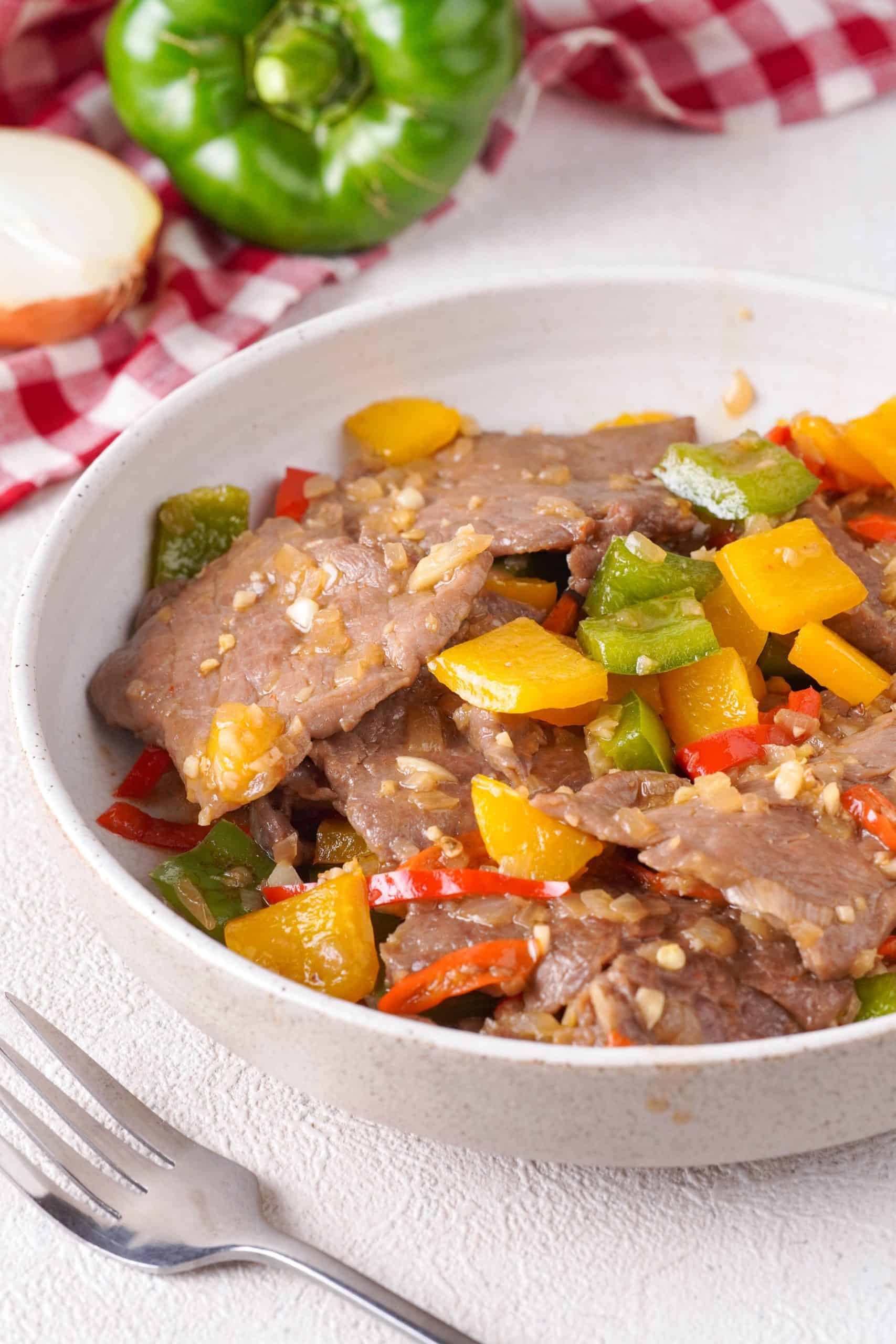Today, I've picked a dish that comes from the Hunan province to share with you, Hunan beef. It's a spicy stir-fried dish made from thinly sliced beef and fresh vegetables, and it won't take you more than 30 minutes to make.