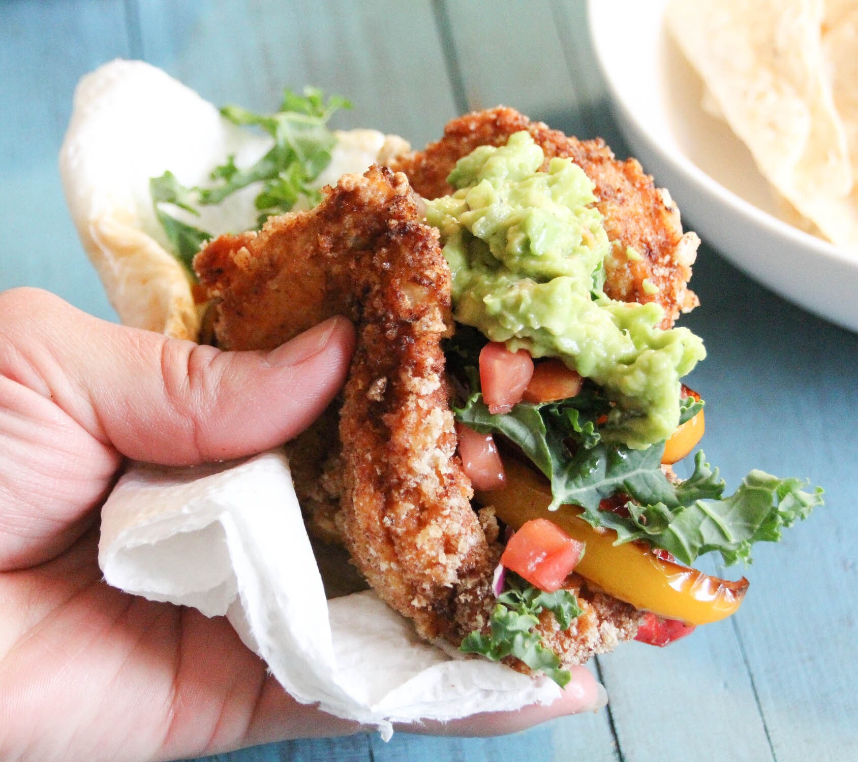 Filled with your favorite veggie toppings, this Keto Fried Chicken Taco Shell has taken tacos or a chalupa to the next level.   You only need 5-ingredients to make this low-carb Keto Taco Shell that will change your life.  