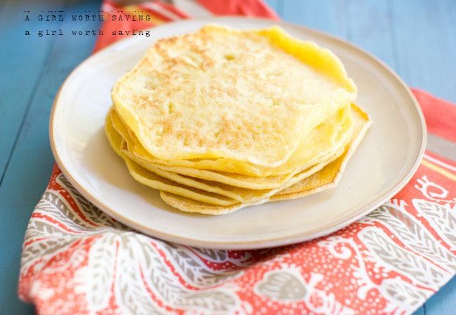 Paleo tortillas stacked  on a plate on a table cloth