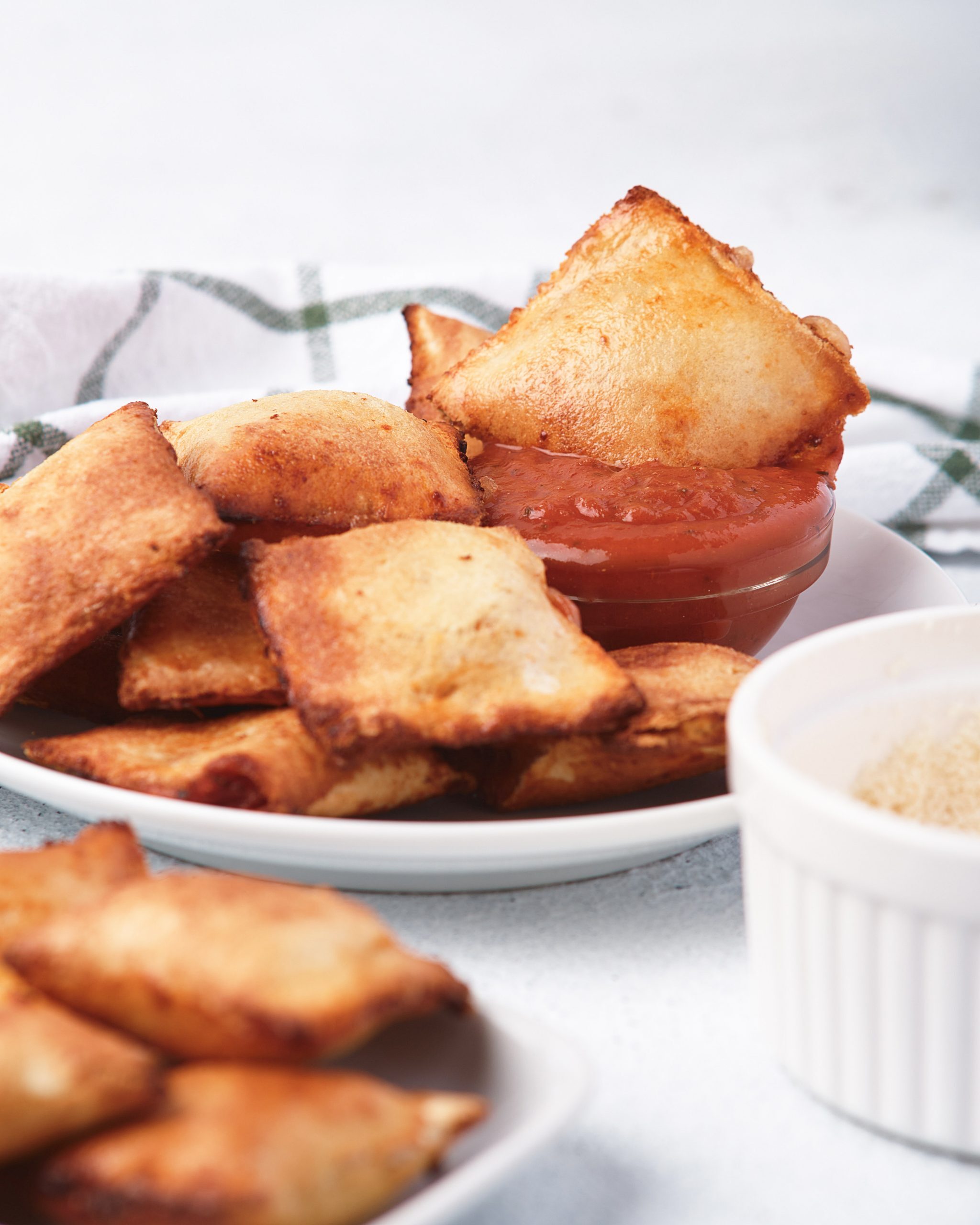Recipe Index Kelly Bejelly Air Fryer Pizza Rolls on a plate