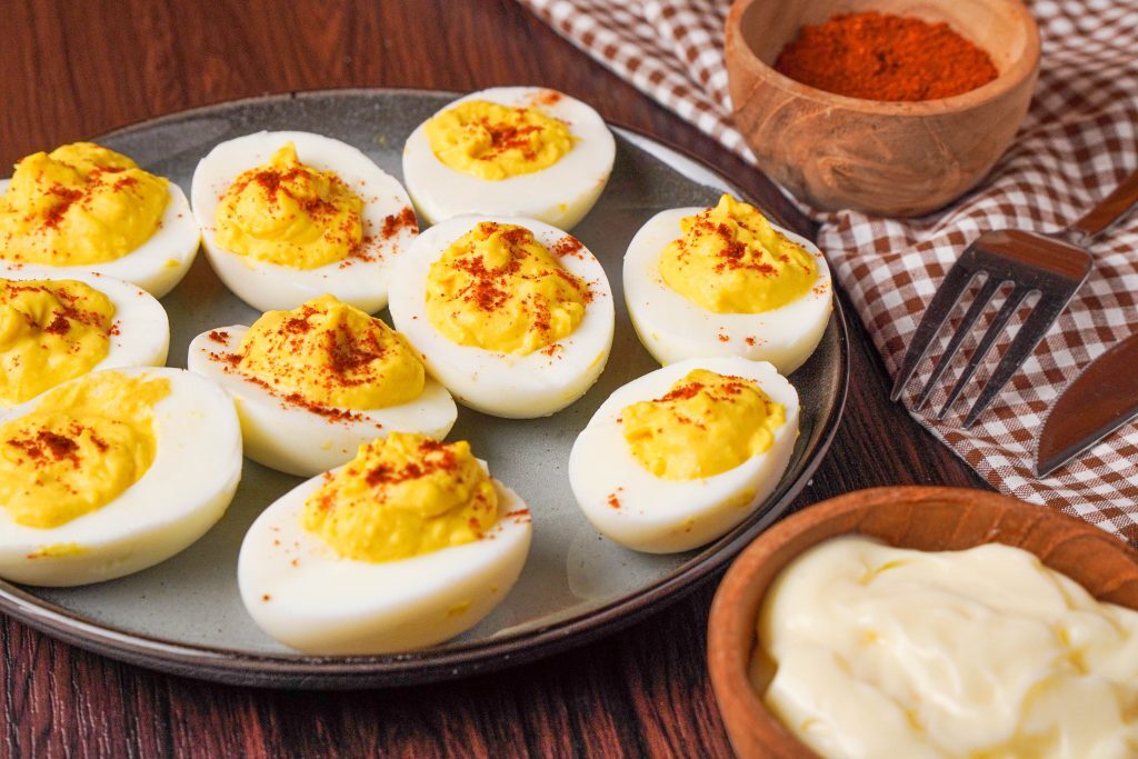 Keto Deviled Eggs Kelly Bejelly plate of keto deviled eggs with spices
