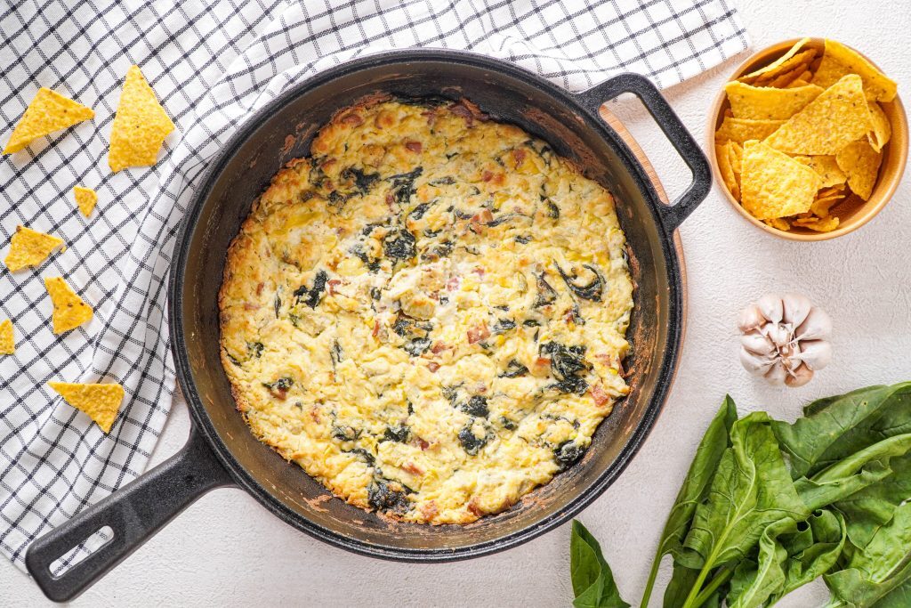 The Best Keto Spinach Artichoke Dip You'll Ever Eat Kelly Bejelly This Keto spinach artichoke dip is rich and creamy and a crowd-pleaser. Packed full of spinach, artichoke, rich cheeses and bacon, you will wow your tastebuds.