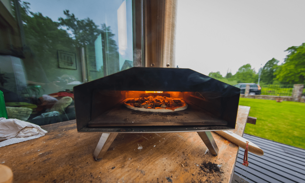 Best Ooni Pizza Oven: Guide to All Models Kelly Bejelly Outdoor pizza oven on a table top