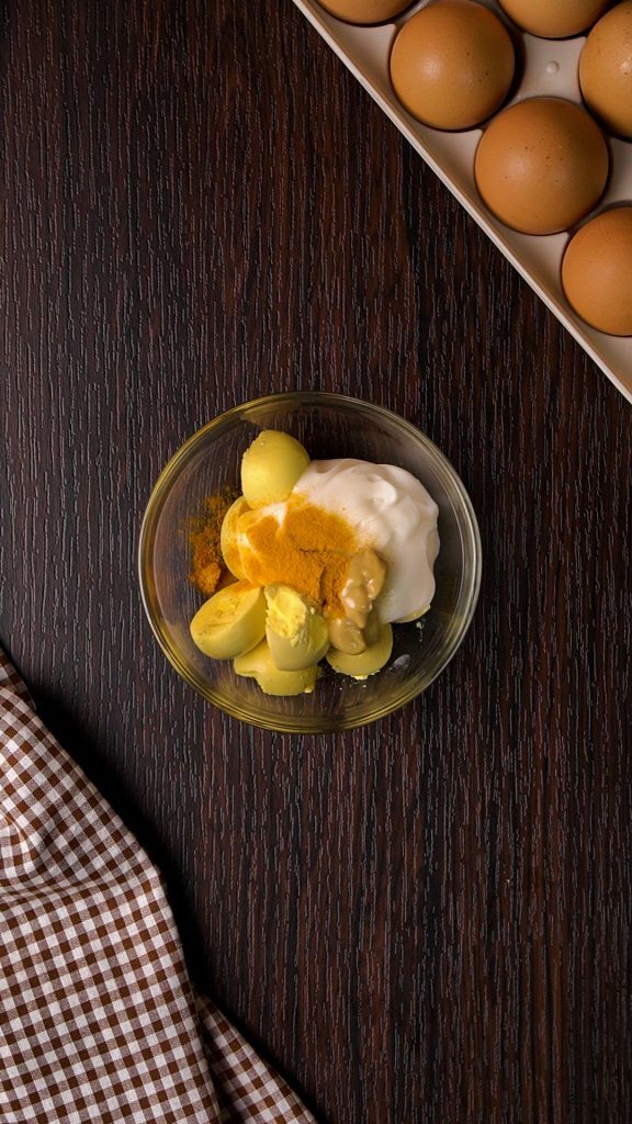 Keto Deviled Eggs Kelly Bejelly Egg yolks, mayo, mustard and spices in a bowl