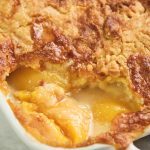 Easy Peach Cobbler with Cake Mix Kelly Bejelly close up of peach cobbler with cake mix