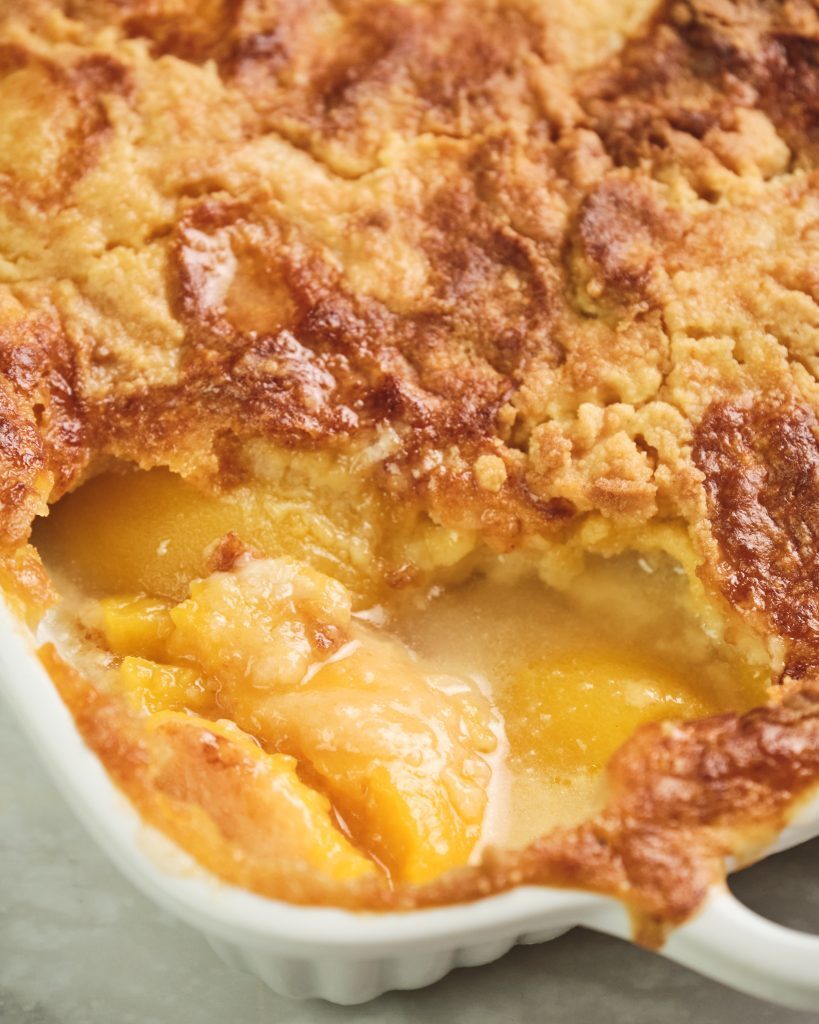 Easy Peach Cobbler with Cake Mix Kelly Bejelly Close up of peach cobbler with cake mix