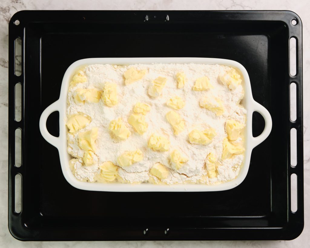Easy Peach Cobbler with Cake Mix Kelly Bejelly butter on top of cake mix peach cobbler
