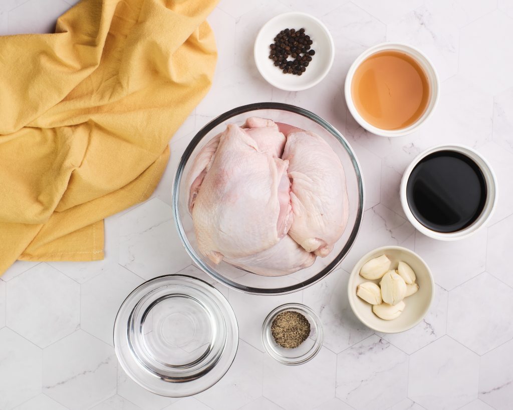 Chicken Adobo Recipe Kelly Bejelly Ingredients to make chicken adobo - chicken thighs, soy sauce, garlic, peppercorns and vinegar